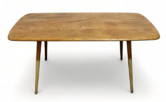 An Ercol elm and beech Windsor dining table - model 382, the plank top above splayed tapered