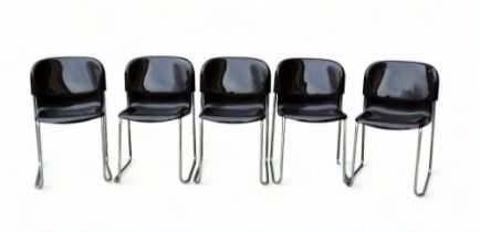 A set of five brown polycarbonate and chrome stacking chairs by Gerd Lange for Drabert - the moulded