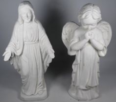 A plaster statue of an angel, height 36cm, together with a similar of Jesus, height 37cm.
