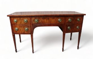 A George III mahogany bow front sideboard - with satinwood stringing above an arrangement of three