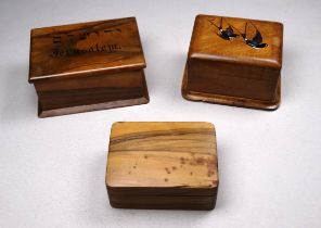 An early 20th century olivewood stamp box - decorated with house martins, width 7cm, together with