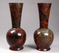 A pair of early 20th century serpentine vases - bulbous bases with trumpet shaped necks, height