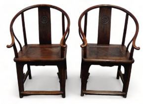 A pair of late 19th century Chinese oriental hardwood horseshoe back chairs - with carved