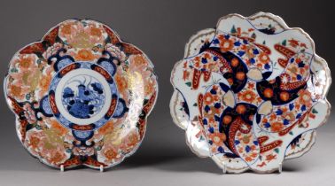 A 20th century Imari plate - of lobed form and decorated in gilt with dragons, diameter 20cm,