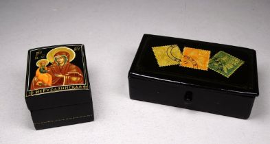 An early 20th century French papier mache stamp box, width 9cm, together with a Russian box