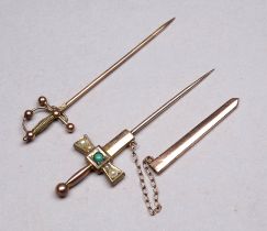 A 9ct gold stock pin modelled as a sword - together with another with scabbard and set with pearls