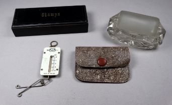 A 19th century clear glass stamp roller - width 9cm, together with a set of pocket stamp scales