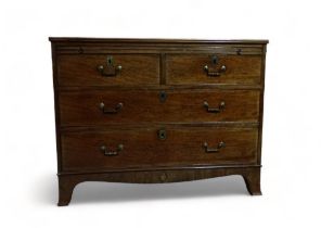 A George III mahogany chest of drawers - converted from a linen press, the rectangular top above a