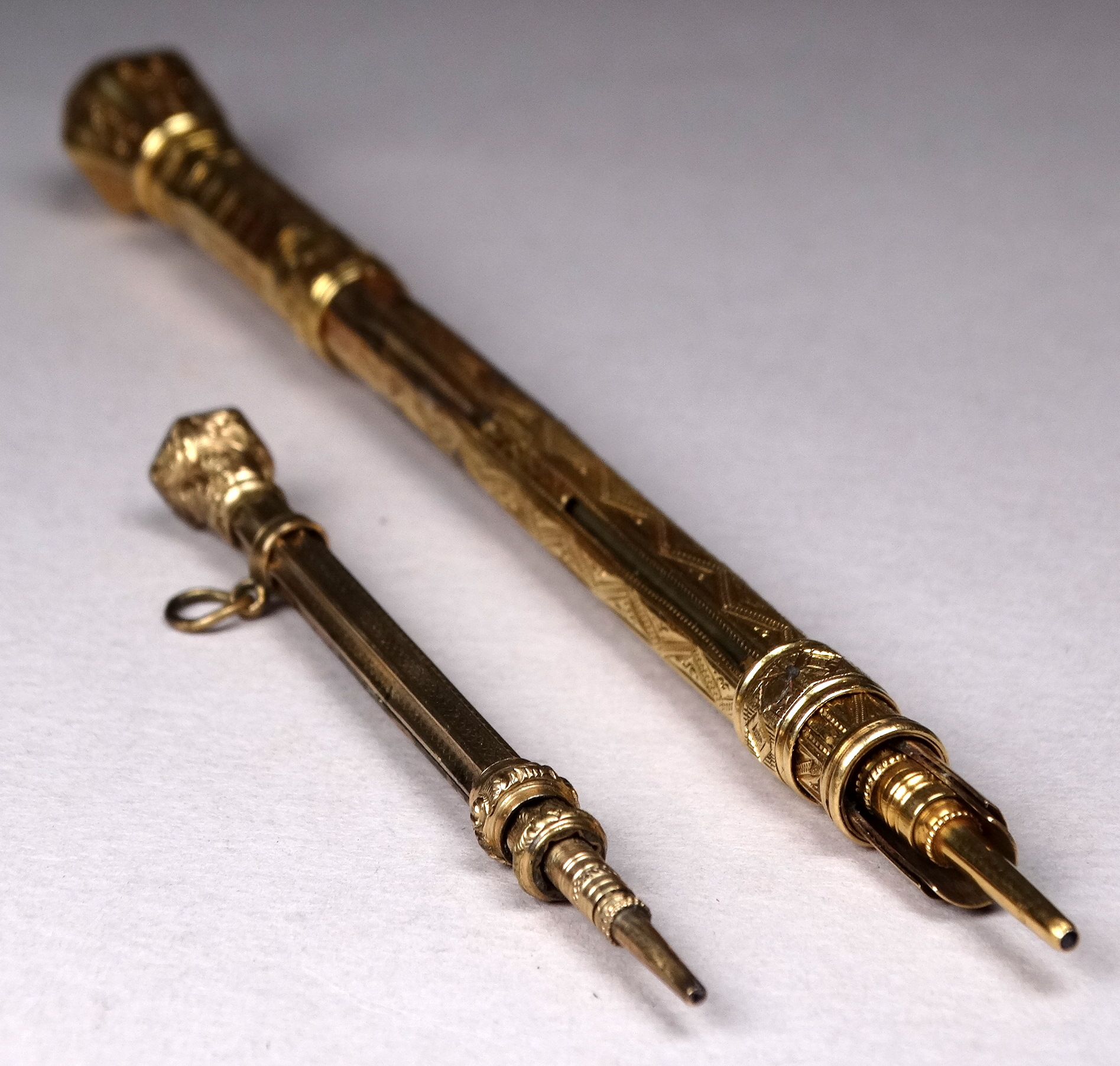 A 19th century gilt pen pencil - incorporating a French perpetual calendar to the top, with a - Image 4 of 4