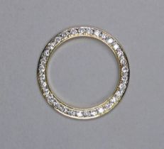 An 18ct yellow gold afterset diamond bezel - the diamonds totalling 1ct approximately.