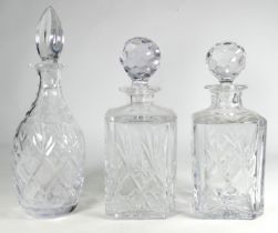 A pair of 20th century cut glass decanters - square with chamfered corners, height 24cm, together