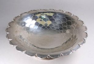 A silver dish - Sheffield 1934, Mappin & Webb, circular with a scale pattern and a presentation