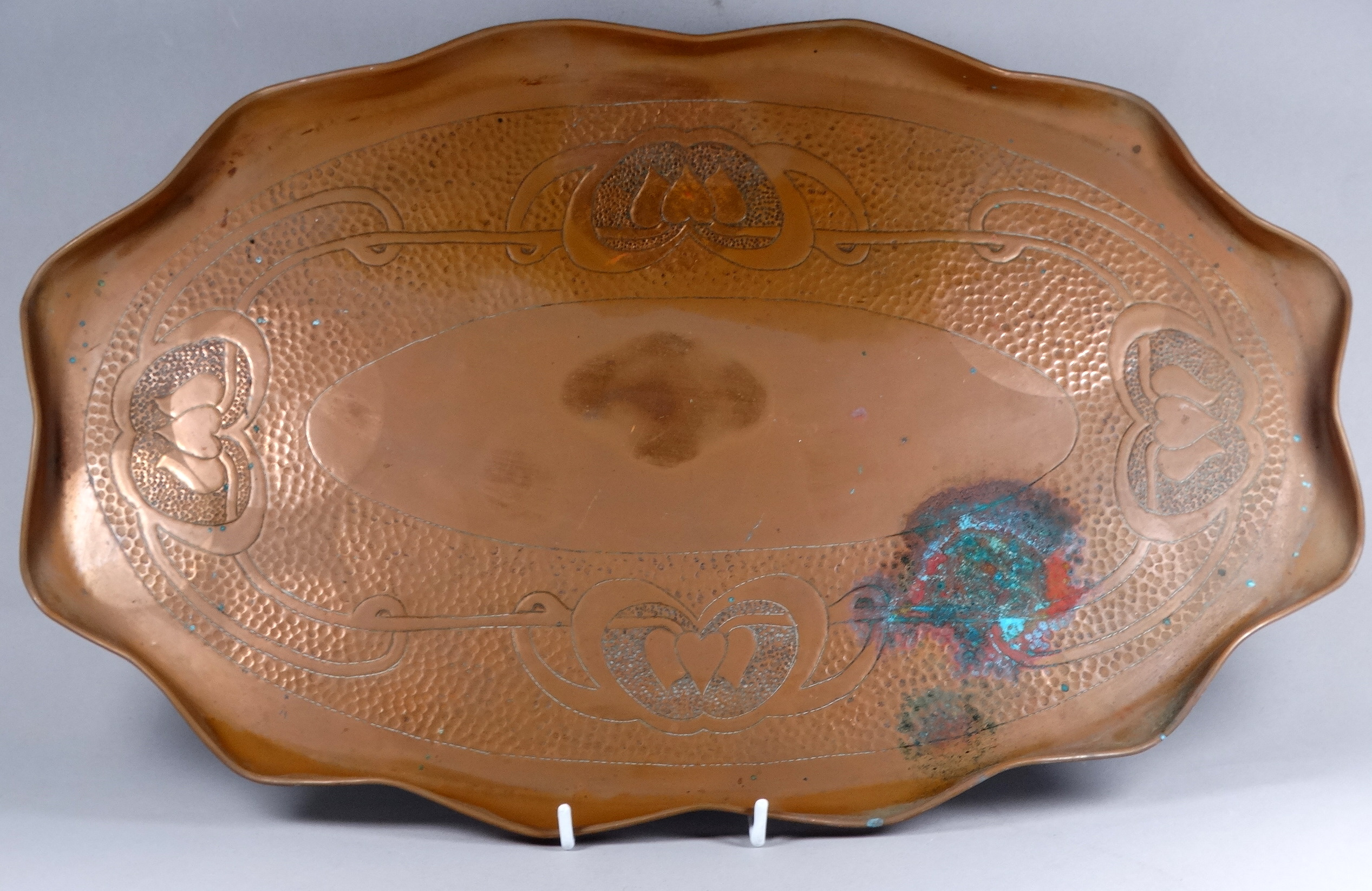 An early 20th century copper tray - in the Art Noveau style, oval with a shaped edge, together - Image 3 of 6