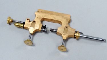 An early 20th century Jacot tool - brass with steel components.