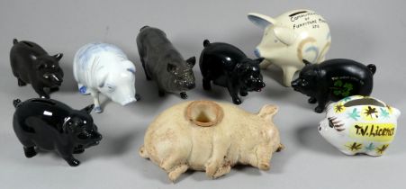 A Royal Doulton Vietnamese pot-bellied pig - length 16cm, together with eight other sundry pigs