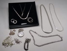 A quantity of silver jewellery - including necklaces, fine chains and watch chains, weight 165g.