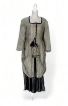 A re-enactment dress - in the form of a mid 19th century American woman, approx size 16, of white