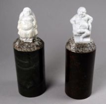 A pair of Cornish turned serpentine desk weights - cylindrical and surmounted by 19th century German