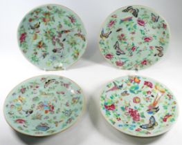 Four Chinese celadon plates - decorated with enamels showing exotic birds and butterflies,