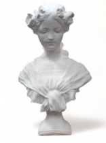 A bust of a young woman - a flower in her hair and raised on a square base, height 48cm.
