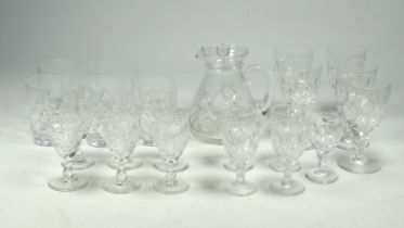 A quantity of 20th century Stuart cut glass - including a small lidded water jug, six small barrel