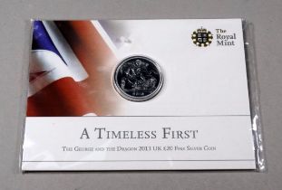 A Royal Mint £20 coin - 2013 silver proof, uncirculated.