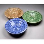 A set of three Wade coronation dishes - 1953, with low relief decoration in differing colourways.