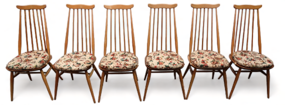 A set of six Ercol Goldsmith dining chairs - model 369, bearing labels to the seat, on turned legs