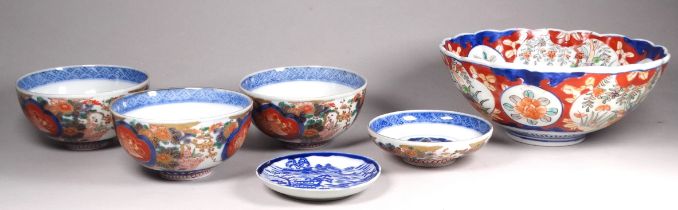 An early 20th century Imari bowl - with a scalloped rim, diameter 22cm, together with three small