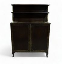 A late George III mahogany chiffonier - the raised back with two open tiers with brass supports,