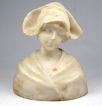 A late 19th century alabaster bust of a young woman - height 14.5cm.