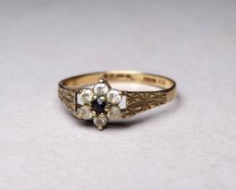 A 9ct gold sapphire and diamond ring, in a flower setting, size Q, weight 1.6g.