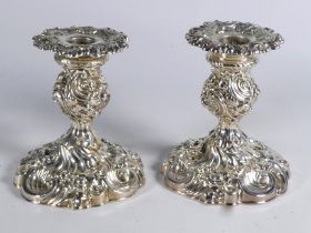 A pair of silver desk candlesticks - Birmingham 1905, Williams (Birmingham) Ltd, in the Rococo style