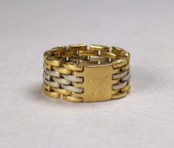 An 18ct bi-colour gold gatelink ring - with a plaque incorporating the initial 'A', weight 5.7g.