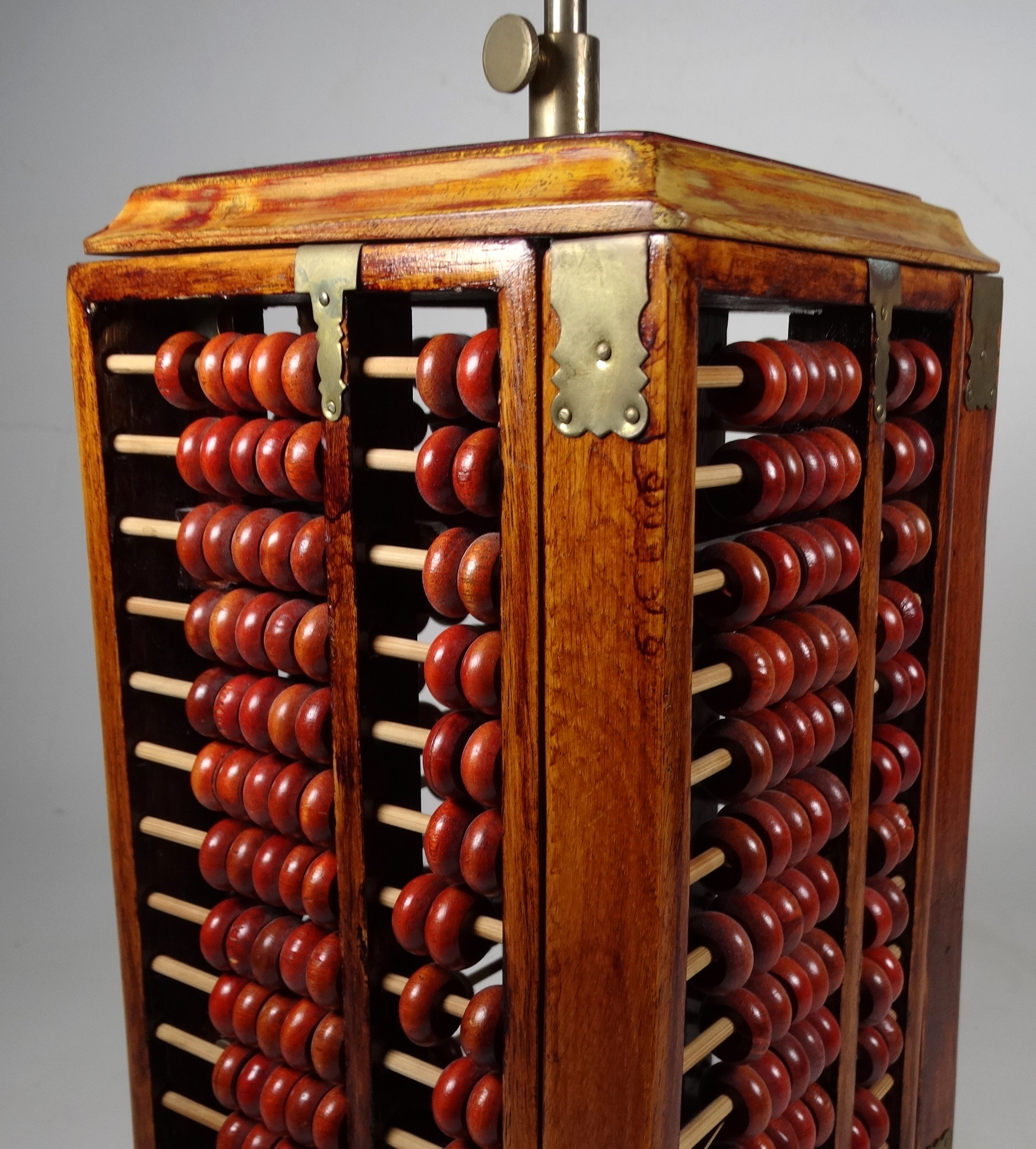 A 20th century oriental table lamp - of square form with abacus panels and a conical rafia shade, - Image 4 of 4