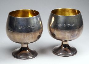 A pair of silver brandy goblets - Brimingham 1972, A. T. Cannon Ltd, with gilt interiors and