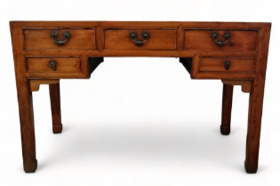 A late 19th century Chinese side table - of rectangular form with an arrangement of five drawers, on