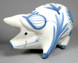 A Rye Pottery pig - by David Sharp, decorated with blue foliage and flowers, width 19cm, together