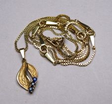 A 14ct gold necklace - with a leaf pendant set with blue gemstones, weight 11.6g.