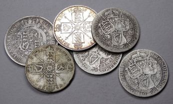 A George III half crown - dated 1817, together with four Victorian florins dated 1887,1899 and 1900,