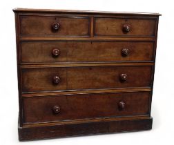 A Victorian mahogany chest of drawers - the rectangular moulded top above an arrangement of two