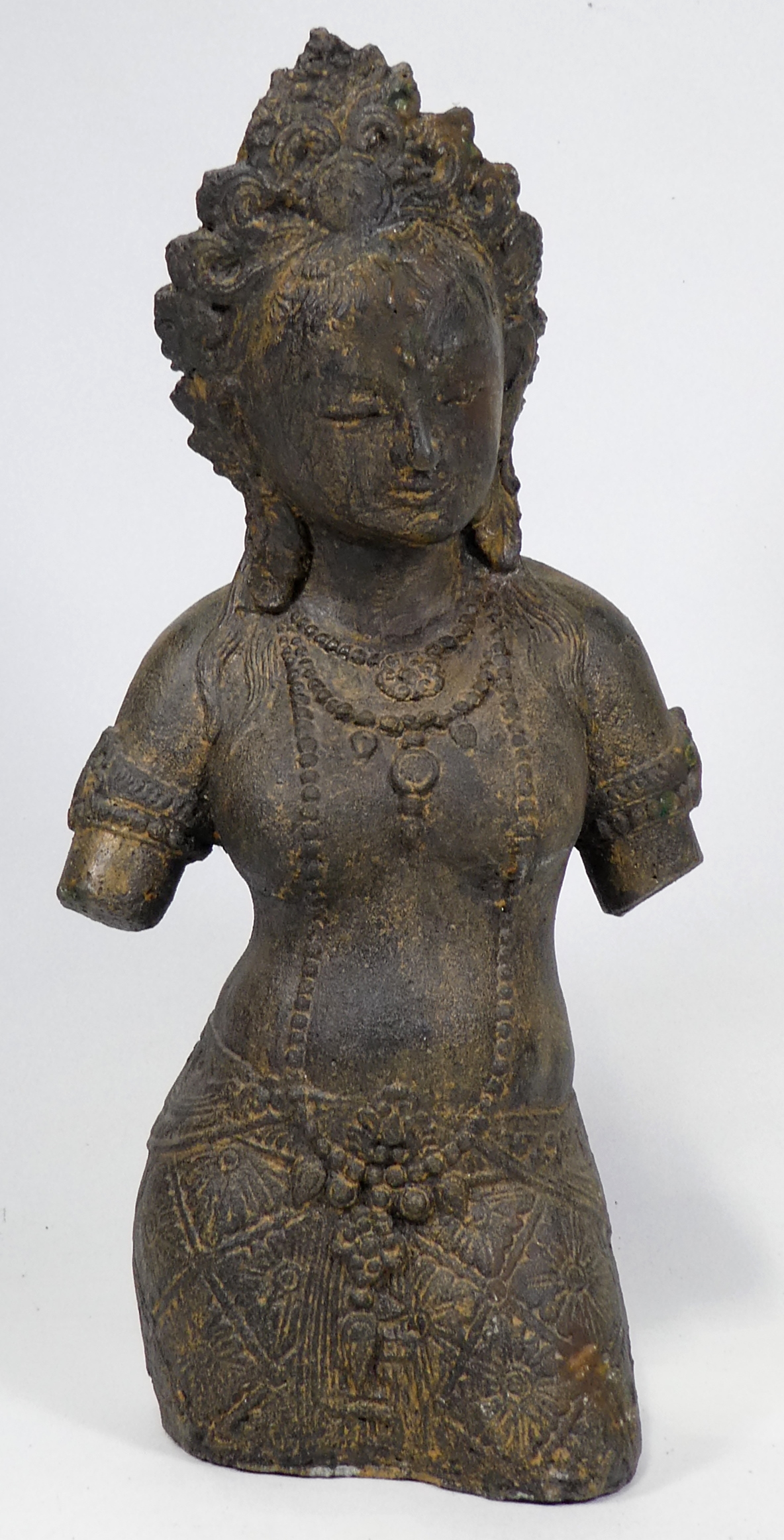 A Balinese deity figure - wearing traditional robes, height 41cm.
