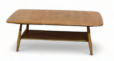 An Ercol elm and beech coffee table - model 459, of rectangular form with a slatted undertier and