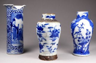 A Chinese blue and white baluster shaped vase - decorated with flowers, height 13cm, together with