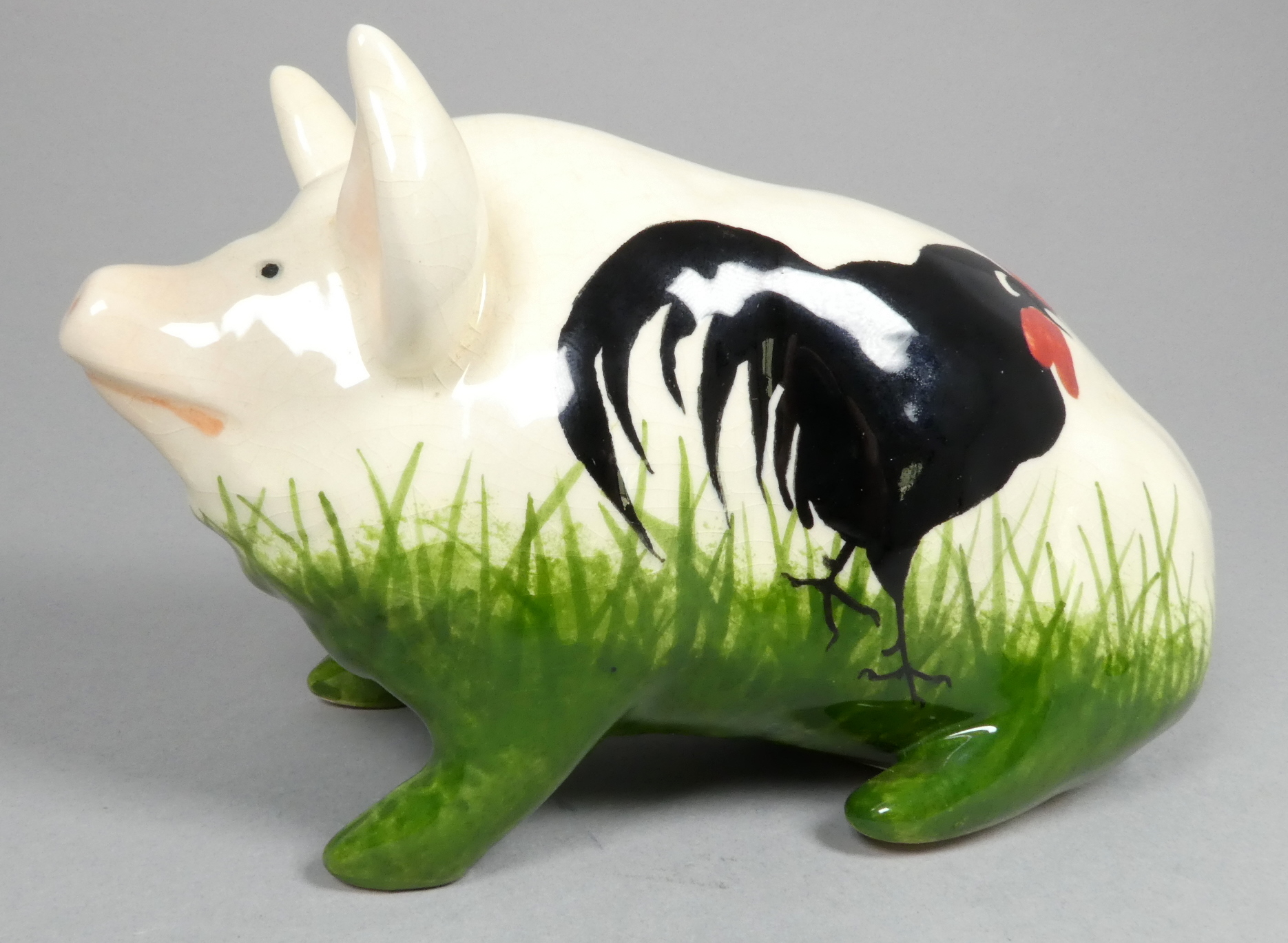 A Wemyss Griselda Hill pottery pig - seated, decorated with black chickens, width 18cm. - Image 3 of 5