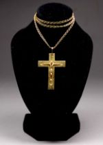 A 9ct gold crucifix - on an anchor link chain, weight 8.7g.