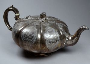 A Victorian silver teapot - London 1862, Alfred Ivory, of squat gourd form with foliate engraved