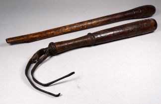 A late 19th century leather clad priest - with a woven handle, length 30cm, together with another