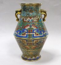 A large 19th century cloisonne vase - with twin elephant masks handles, height 31cm.