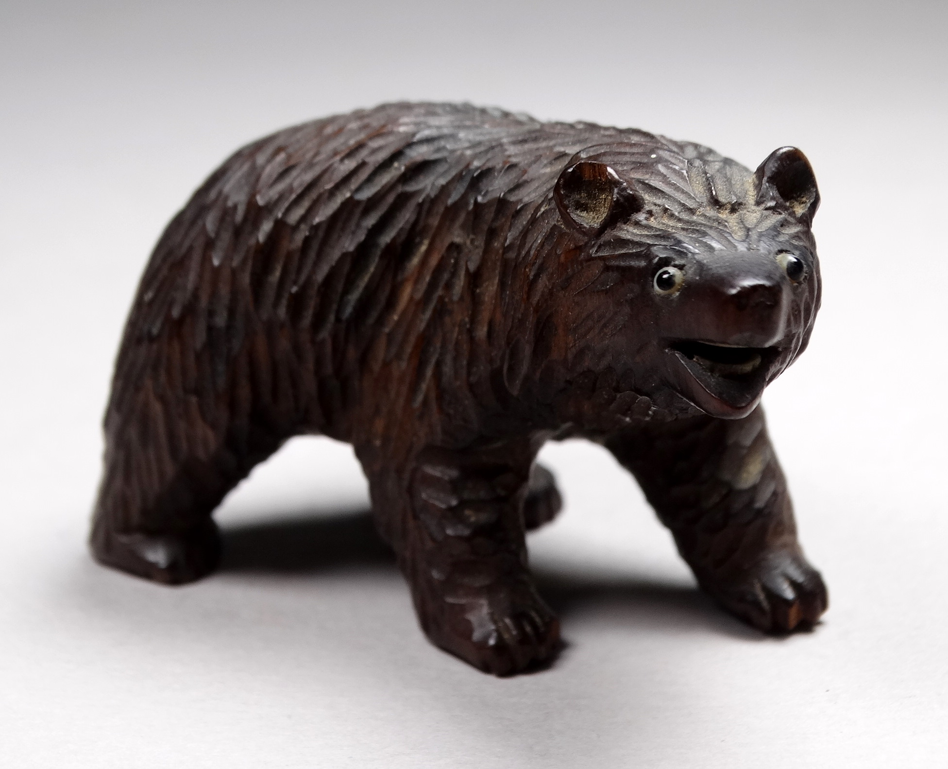 An early 20th century Black Forest bear - standing on skis, height 6cm, together with another, two - Image 3 of 6